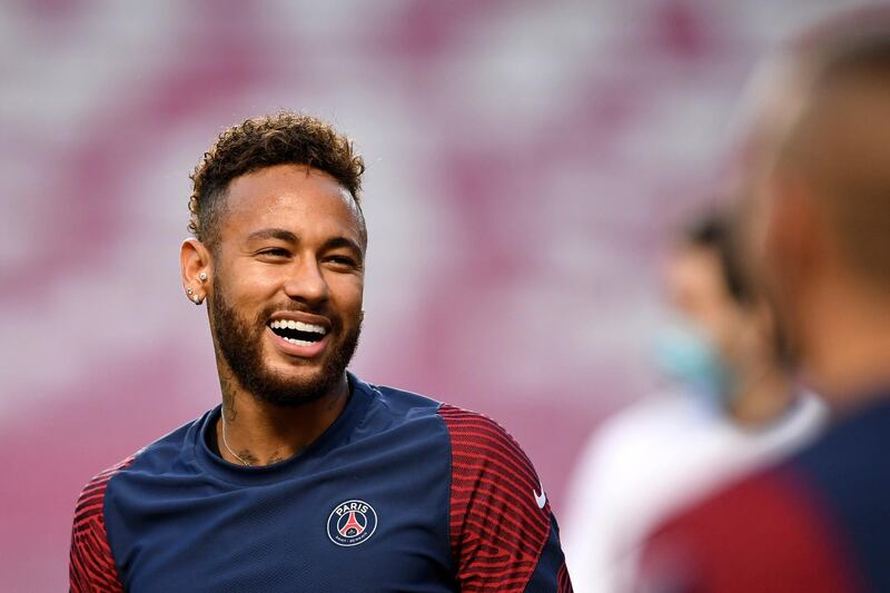 PSG's Neymar smiles the warm up before the final. Pool via AP