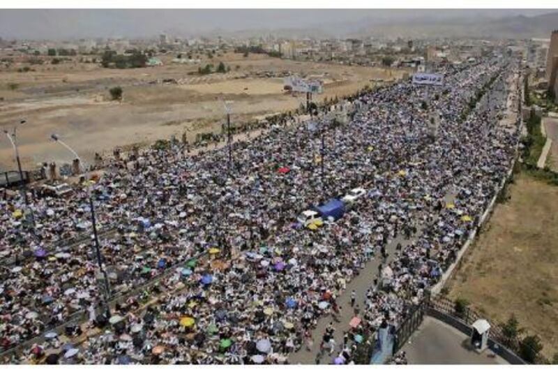 Anti-government protesters attend a demonstration demanding the resignation of Yemen's President Ali Abdullah Saleh in Sanaa. Hani Mohammed / AP Photo