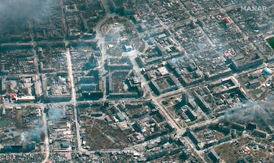 This satellite image shows the damaged Mariupol Drama Theatre, top centre, and the area around it in Mariupol, Ukraine. AP 