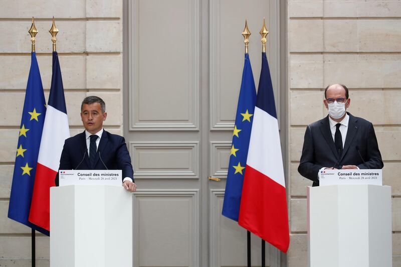 epa09165075 French Prime Minister Jean Castex (R) and French Interior Minister Gerald Darmanin (L) attend a news conference following the weekly cabinet meeting discussions over a bill for the prevention of acts of terrorism at the Elysee Palace in Paris, France, 28 April 2021.  EPA/GONZALO FUENTES / POOL  MAXPPP OUT