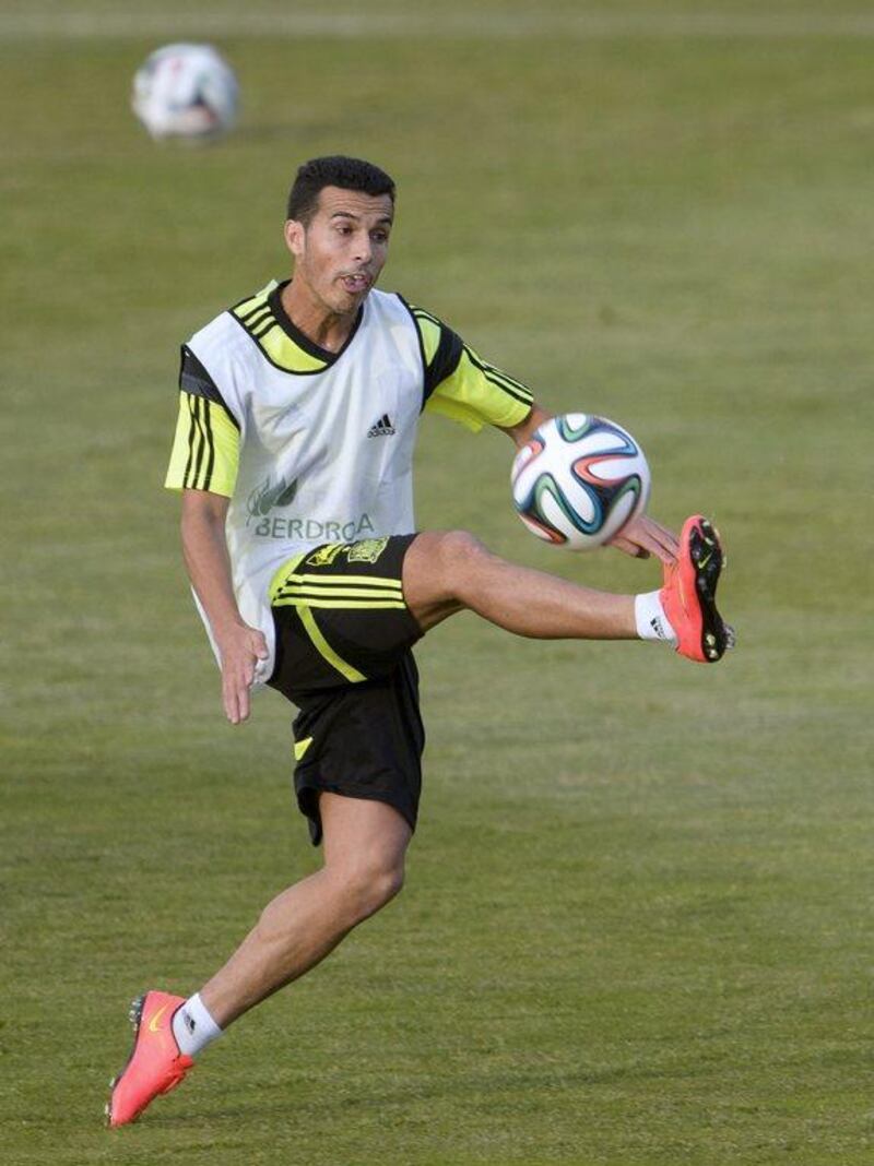 Spain midfielder Pedro Rodriguez juggles the ball during Monday's team training session ahead of the 2014 World Cup. Dani Pozo / AFP / May 26, 2014