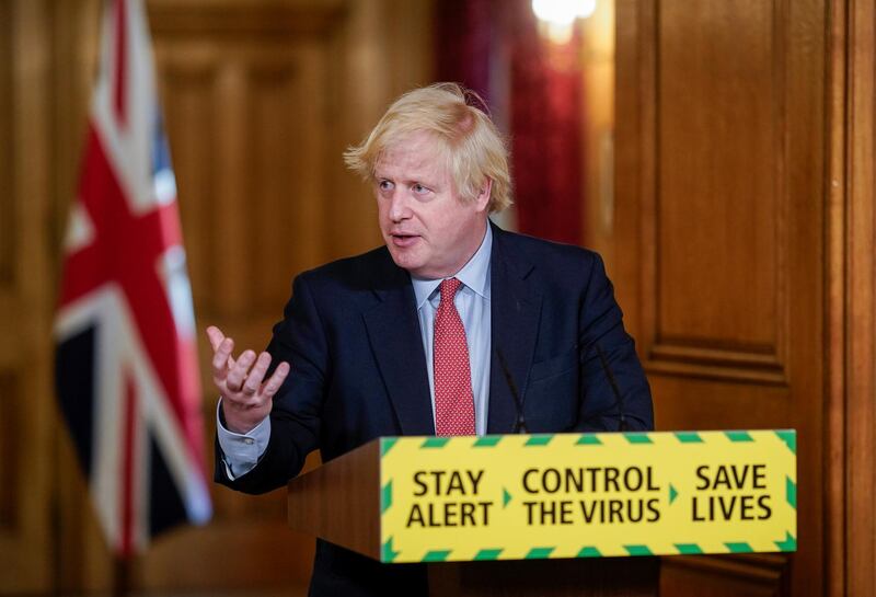 Britain's Prime Minister Boris Johnson holds a daily news conference with Public Health England's (PHE) Medical Director Yvonne Doyle (not pictured), on the coronavirus disease (COVID-19) outbreak, at 10 Downing Street in London, Britain May 25, 2020. Andrew Parsons/10 Downing Street/Handout via REUTERS THIS IMAGE HAS BEEN SUPPLIED BY A THIRD PARTY. IMAGE CAN NOT BE USED FOR ADVERTISING OR COMMERCIAL USE. THE IMAGE CAN NOT BE ALTERED IN ANY FORM. NO RESALES. NO ARCHIVES