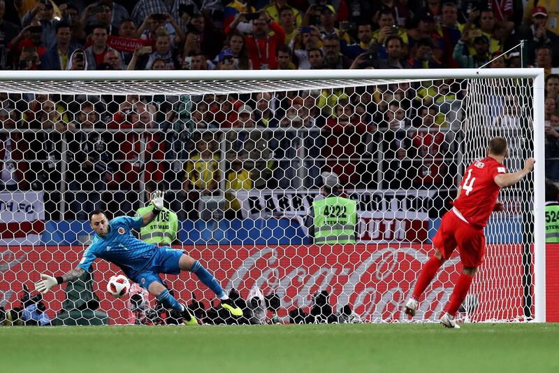 England's Eric Dier scores the winning penalty. Ryan Pierse / Getty Images