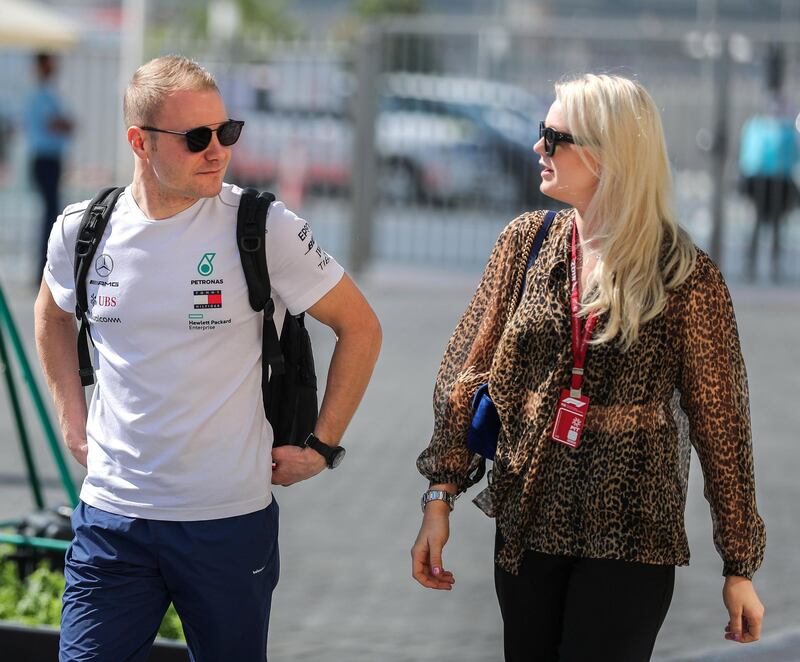 Abu Dhabi, U.A.E., November 23, 2018.  
Racers coming in at the paddocks area. --Valtteri Bottas of Mercedes AMG Petronas F1 Team arrives with his wife, Emilia Pikkarainen. 
Victor Besa / The National
Section:  NA
Reporter: