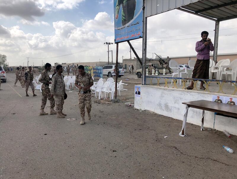 Soldiers inspect the scene of a Houthi drone attack at Yemeni government military parade in al-Anad air base, Lahaj province, Yemen January 10, 2019. REUTERS/Stringer NO RESALES. NO ARCHIVE