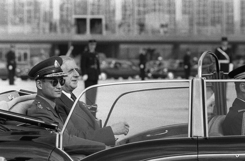 The king, left, riding with French president Charles de Gaulle upon his arrival at Orly airport, south of Paris on October 11, 1960. AFP