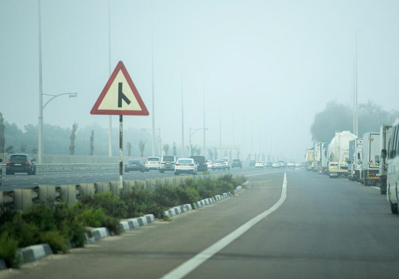 Abu Dhabi, United Arab Emirates, March 4, 2021.  Foggy morning at Abu Dhabi.  Trucks and large vehicles pull to the side of the E10 highway for sfety reasons during fog.
Victor Besa / The National
Section:  NA