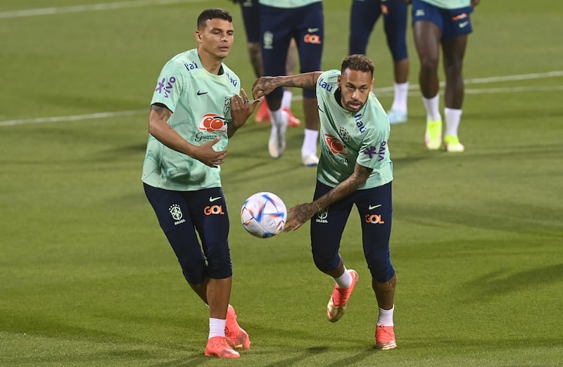 Brazilian players Thiago Silva, left, and Neymar train for their World Cup opener against Serbia. EPA