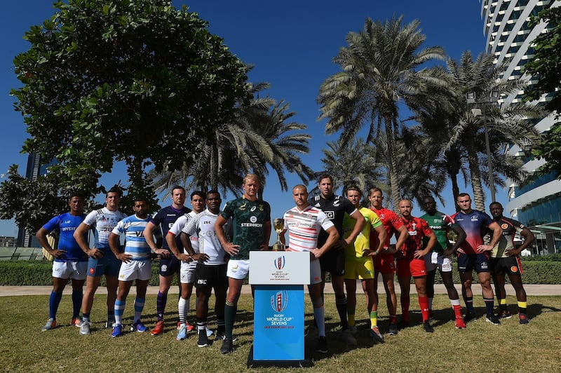 DUBAI, UNITED ARAB EMIRATES - NOVEMBER 29:  Men's team captains pose for photos with the Rugby World Cup Sevens Trophy during the Emirates Dubai Rugby Sevens: HSBC Sevens World Series photocall on November 29, 2017 in Dubai, United Arab Emirates.  (Photo by Tom Dulat/Getty Images)