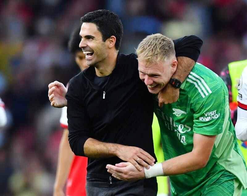 Arsenal manager Mikel Arteta celebrates with Aaron Ramsdale after the 2-0 win at Leicester. Reuters