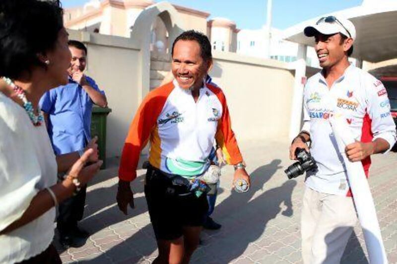 Cesar Guarin, a Filipino marathon runner. His goal is to set a record as the first Filipino and first Asian global runner, covering 42,000km across 47 countries.