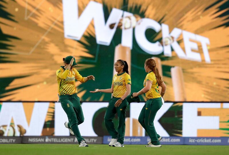 South Africa fielder Shabnim Ismail, centre, is congratulated by teammates after taking a catch to dismiss Australia's Jess Jonassen during the Women's T20 World Cup cricket semi-final against Australia at the Sydney Cricket Ground, on Thursday, March 5. AP
