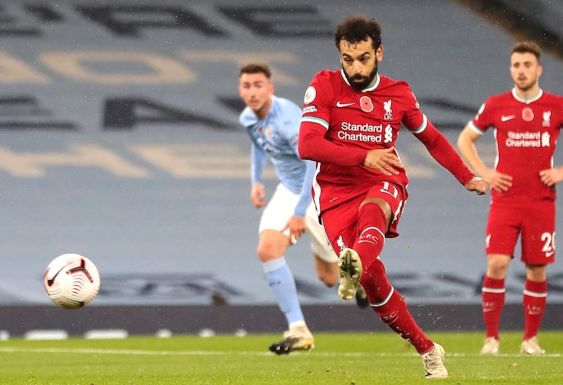 Liverpool attacker Mohamed Salah opens the scoring from the spot. EPA