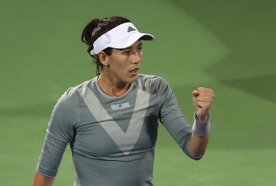 DUBAI, UNITED ARAB EMIRATES - FEBRUARY 21:  Garbine Muguruza of Spain celebrates victory against Catherine Bellis of USA during day three of the WTA Dubai Duty Free Tennis Championship at the Dubai Tennis Stadiumon February 21, 2018 in Dubai, United Arab Emirates.  (Photo by Francois Nel/Getty Images)