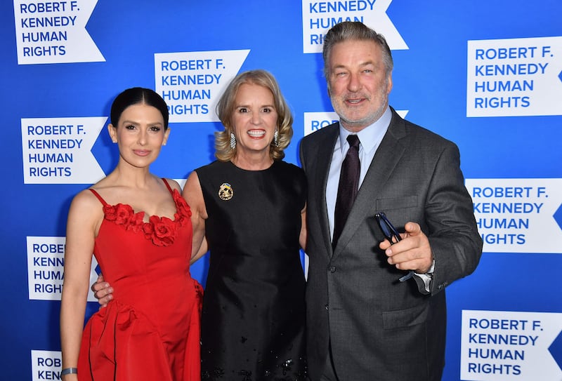 Hilaria and Alec Baldwin with Kerry Kennedy, centre. AFP