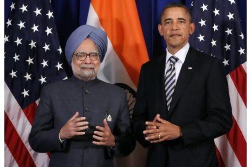 US President Barack Obama meets with India's Prime Minister Manmohan Singh on the sidelines of the Asean and East Asia summit in Bali Friday.