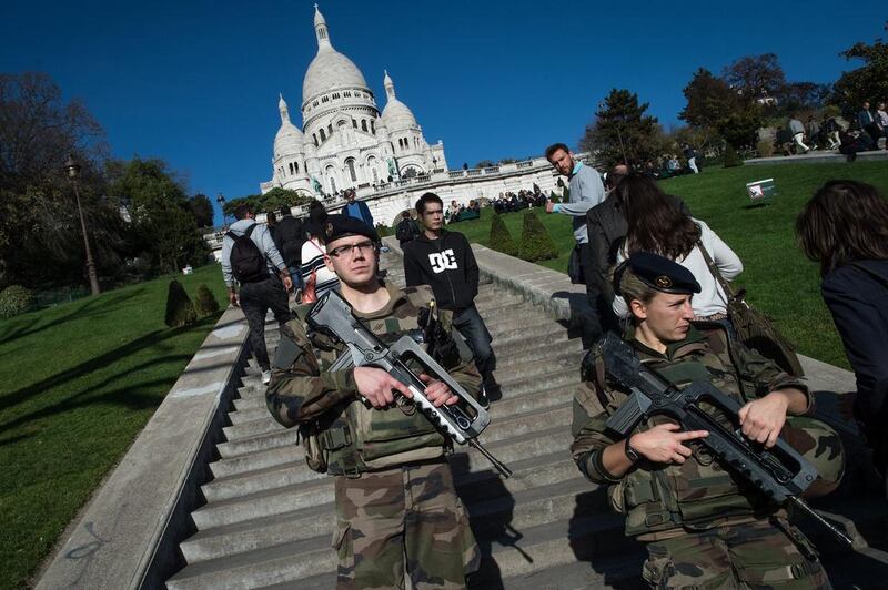 French soldiers guard the Sacre-Coeur cathedral in Paris on November 15, 2015. David Ramos / Getty Images
