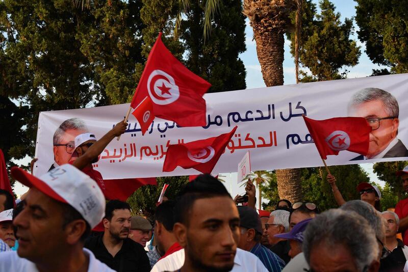 Supporters of former Tunisian defence minister and presidential candidate Abdelkrim Zbidi (not pictured) gather during his presidential campagne tour in the central coast city of Monastir.  Campaigning for Tunisia's presidential election opened on September 2 with 26 candidates vying to replace late leader Beji Caid Essebsi in a vote seen as vital to defending democratic gains in the cradle of the Arab Spring. AFP