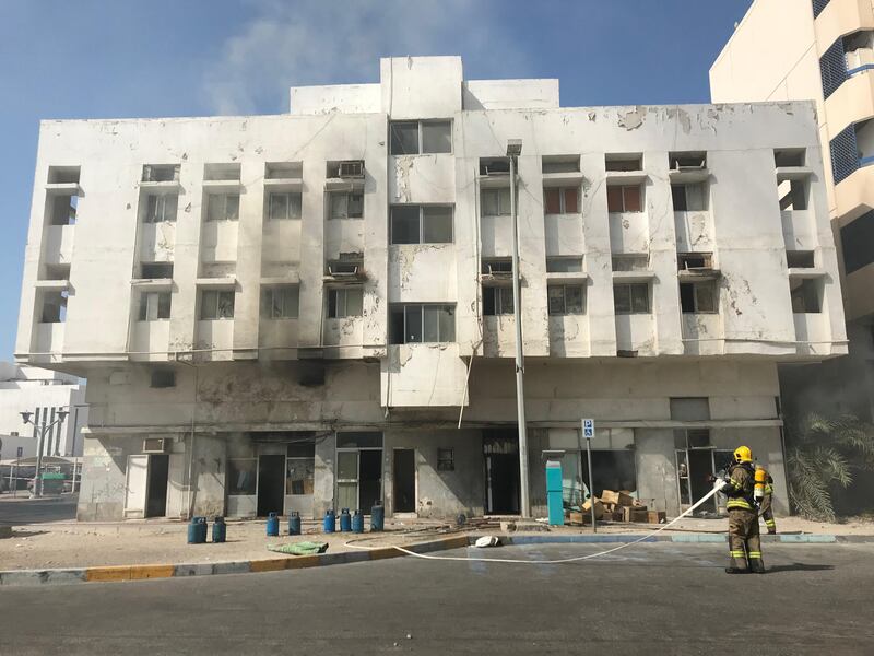 Firefighters contained a blaze that gutted the inside of an abandoned two storey behind Abu Dhabi Media on Monday. Anna Zacharias / The National