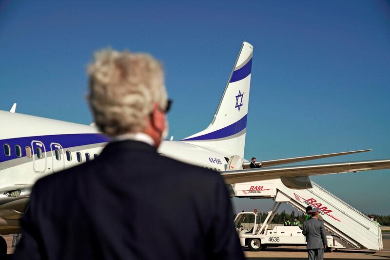 A handout picture released by the US Embassy in Morocco, shows US Ambassador David T. Fischer (L) waiting to welcome US Presidential advisor Jared Kushner in Morocco's capital Rabat, upon landing of the first Israel-Morocco direct commercial flight, marking the latest US-brokered diplomatic normalisation deal between the Jewish state and an Arab country.  AFP