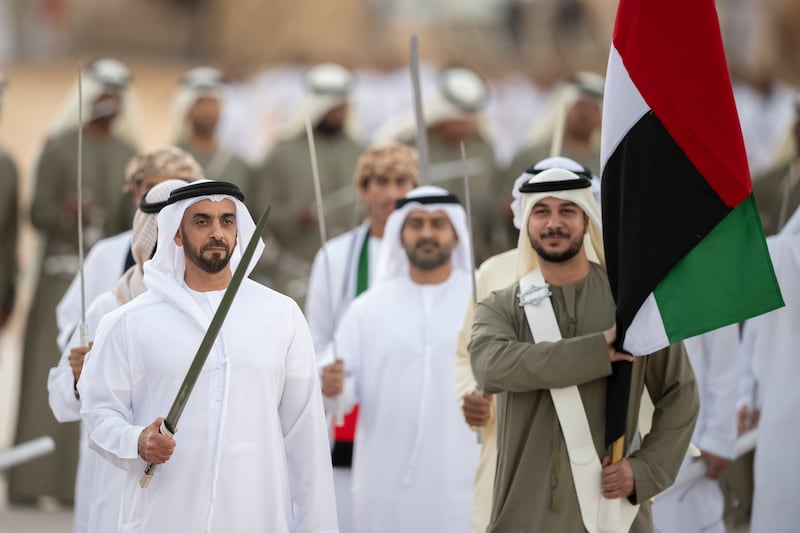 Lt Gen Sheikh Saif bin Zayed, Deputy Prime Minister and Minister of Interior, participates in a traditional ayyala, during the Union Parade, during the Sheikh Zayed Heritage Festival. Abdullah Al Junaibi for the Presidential Court 