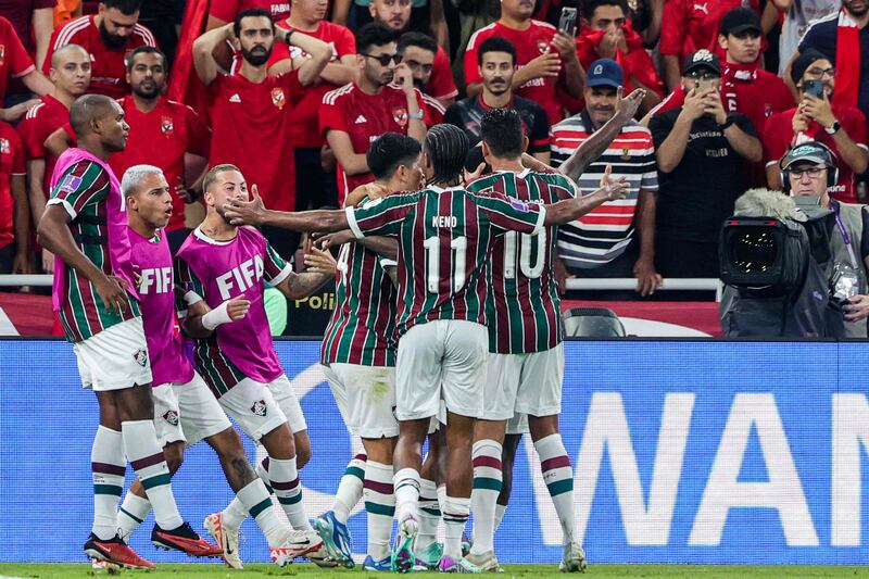 Fluminense players celebrate their first goal. AFP