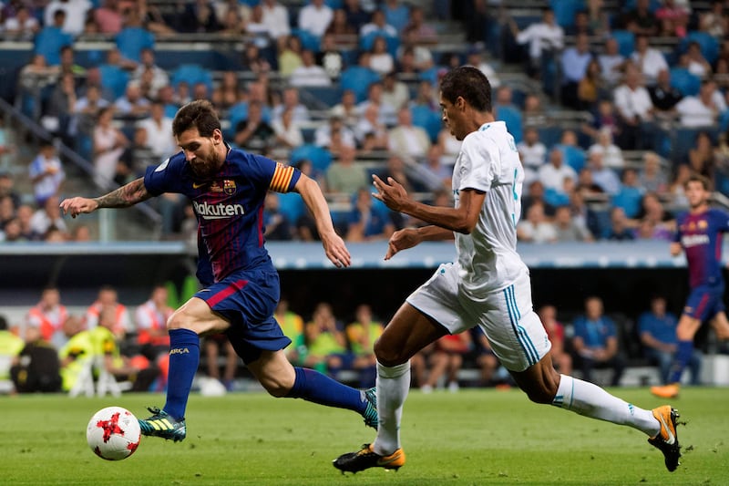 Barcelona's Lionel Messi dribbles with the ball. Curto de la Torre / AFP