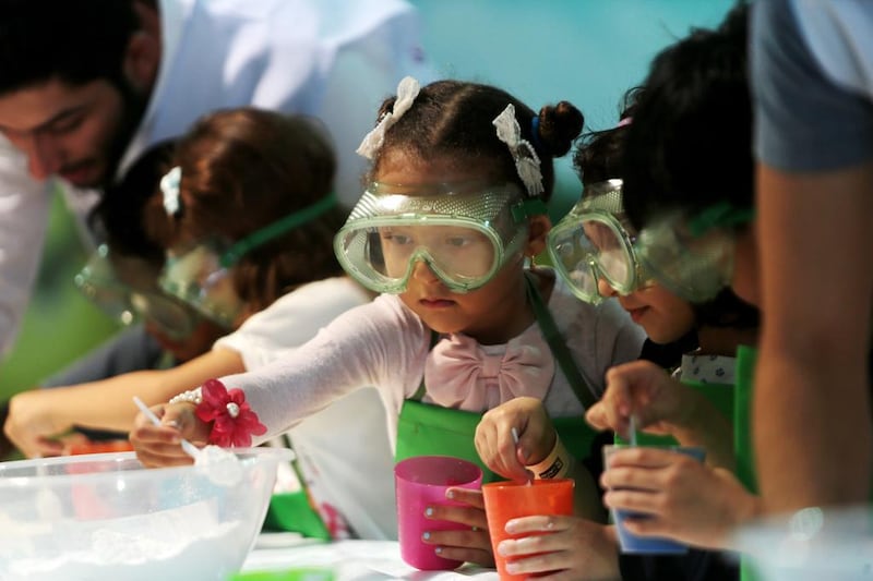 Children take part in an activity on the opening day of the Abu Dhabi Science Festival at Umm Al Emarat Park in Abu Dhabi in 2016. Christopher Pike / The National