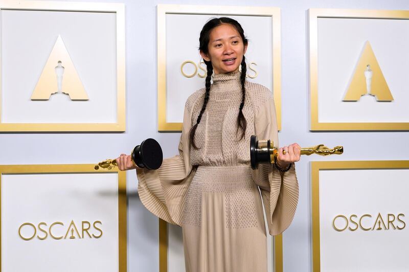 Chloe Zhao poses in the press room with her Oscars at the Academy Awards in Los Angeles, California. Reuters