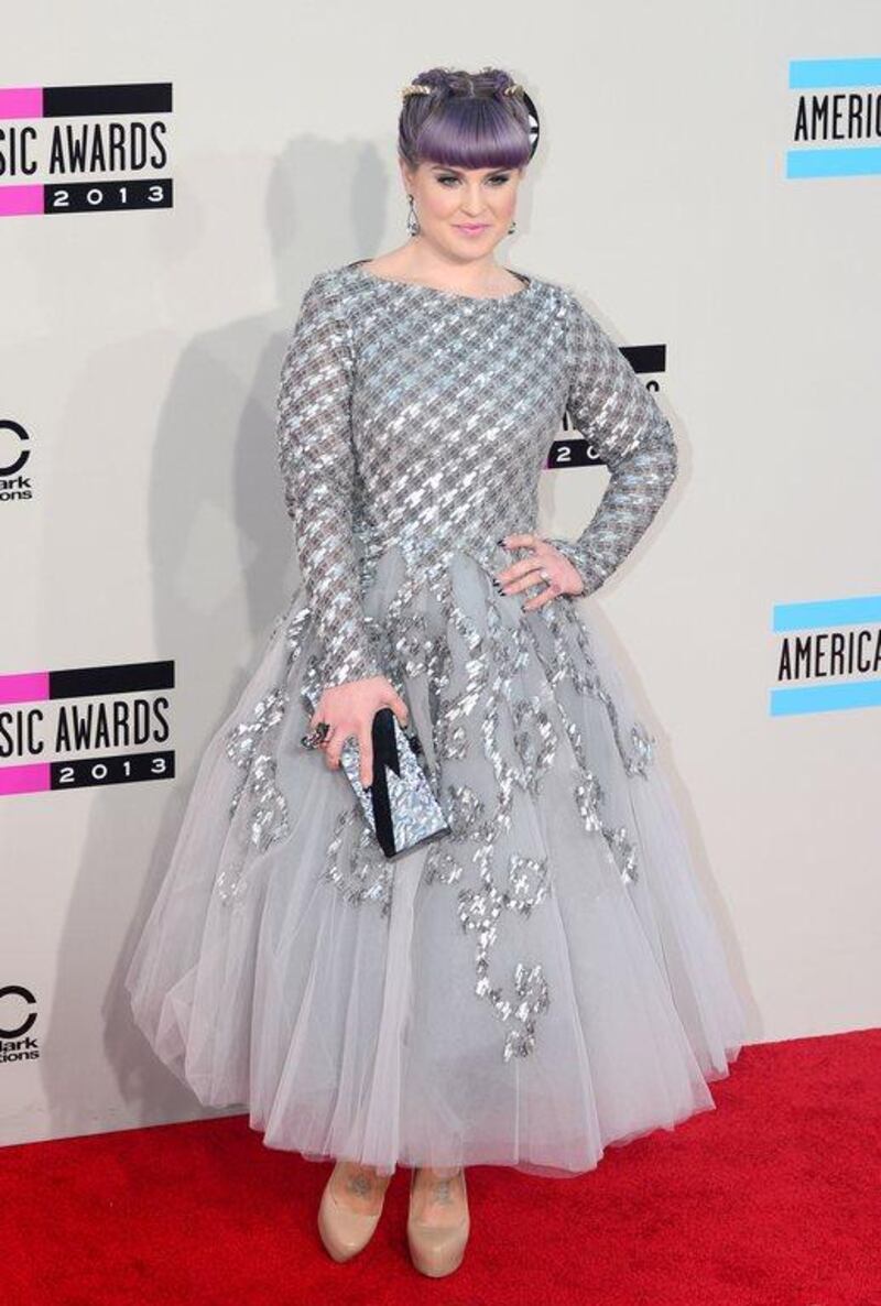 Kelly Osbourne arrives for the 2013 American Music Awards. Frederic J. Brown / AFP Photo