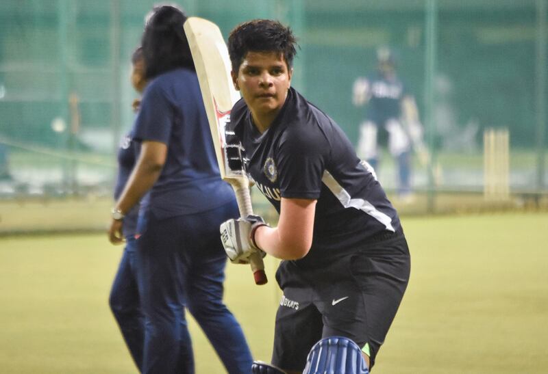 In this photo taken on September 28, 2019 cricketer Shafali Verma trains during an Indian cricket team practice session in Surat, ahead of a Twenty20 match between India and South Africa. - India's 15-year-old women's cricket sensation Shafali Verma had to get her hair cut like a boy so that she could get into the local academy to train, her father told AFP. (Photo by STR / AFP)
