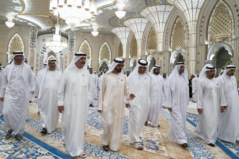 ABU DHABI, UNITED ARAB EMIRATES - May 20, 2018: HH Sheikh Saeed bin Zayed Al Nahyan, Abu Dhabi Ruler's Representative (2nd row L), HH Sheikh Humaid bin Ahmed bin Rashed Al Mualla (2nd row 2nd L), HH Sheikh Saud bin Rashid Al Mu'alla, UAE Supreme Council Member and Ruler of Umm Al Quwain (front row L, HH Sheikh Mohamed bin Rashid Al Maktoum, Vice-President, Prime Minister of the UAE, Ruler of Dubai and Minister of Defence (front row 2nd L), HH Sheikh Saud bin Saqr Al Qasimi, UAE Supreme Council Member and Ruler of Ras Al Khaimah (front row 3rd L), HH Sheikh Hamad bin Mohamed Al Sharqi, UAE Supreme Council Member and Ruler of Fujairah (front row 4th L), HH Sheikh Hamdan bin Zayed Al Nahyan, Ruler’s Representative in Al Dhafra Region (front row 5th L) and HH Sheikh Humaid bin Rashid Al Nuaimi, UAE Supreme Council Member and Ruler of Ajman (R), depart at the end of an iftar reception at the Presidential Palace. 

( Mohamed Al Hammadi / Crown Prince Court - Abu Dhabi )
---