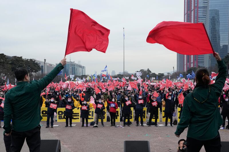 Members of the South Korean Confederation of Trade Unions stage a rally demanding better labour rights in Seoul, South Korea. Thousands of workers defied a government call to avoid the assembly owing to the pandemic. AP