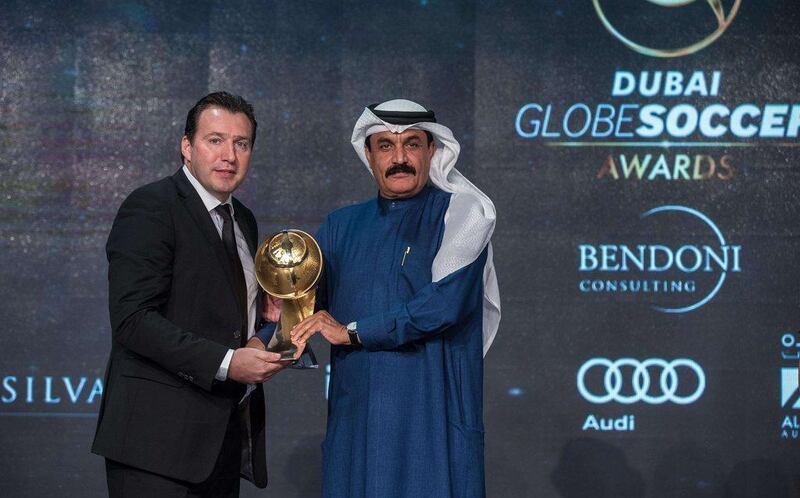 Marc Wilmots of Belgium shown being awarded 'Best Coach of the Year' on Sunday at the Globe Soccer Awards in Dubai. AFP Photo