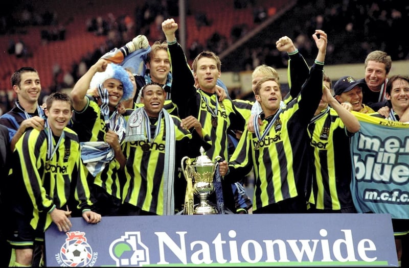 30 May 1999:   Manchester City players celebrate promotion and victory after the Nationwide Division Two Play-Off Final match against Gillingham played at Wembley Stadium in London, England.  The match finished in a 2-2 draw after extra-time and in the penalty shoot-out Manchester City won 3-1 and were promoted to Division One. \ Mandatory Credit: Alex Livesey /Allsport