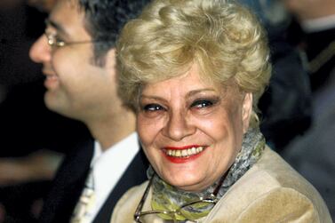 Veteran Egyptian actress Nadia Lutfi flashes a broad smile as she attends the opening lecture of the "Lebanese Days in Egypt" cultural week in Cairo 02 May 2000. (ELECTRONIC IMAGE) (Photo by MARWAN NAAMANI / AFP)