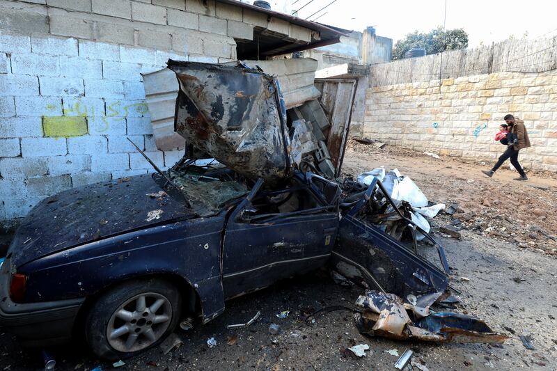 A damaged car at the Jenin refugee camp after an Israeli raid in the occupied West Bank. EPA