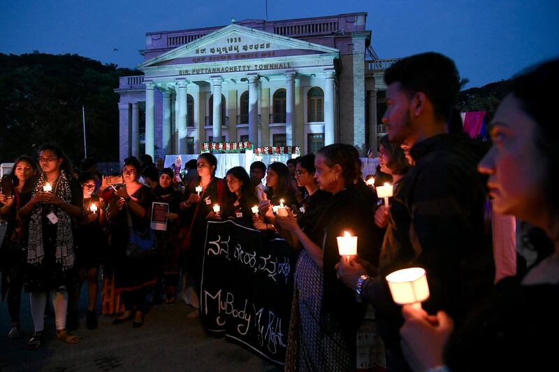 People hold a candlelight vigil in support of sexual assault victims and against the alleged rape and murder of a 27-year-old veterinary doctor in Hyderabad, in Bangalore. AFP