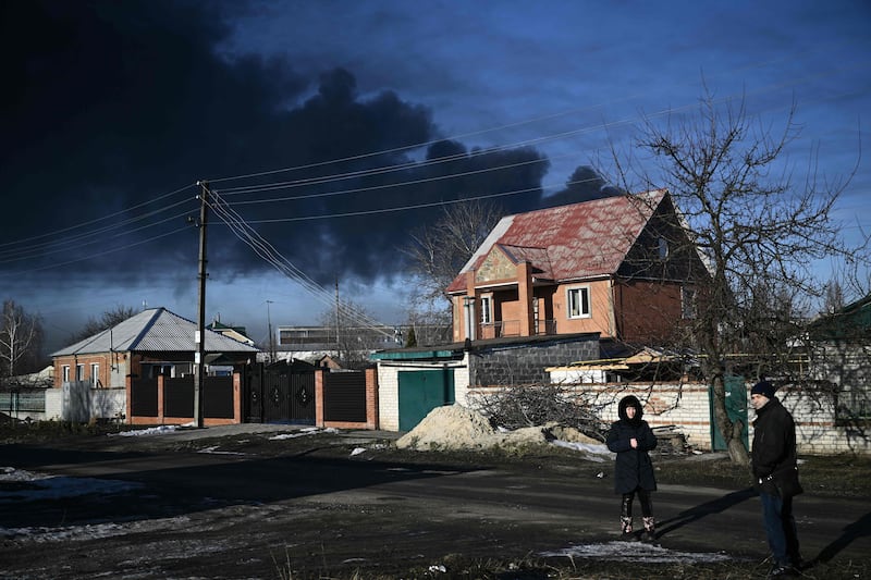 Black smoke rises from a military airport in Chuguyev near Kharkiv. AFP