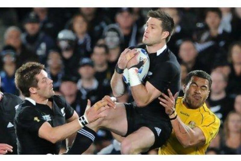 Cory Jane, centre, caught every high ball Australia kicked his way as New Zealand dominated every aspect of their semi-final victory. William West / AFP