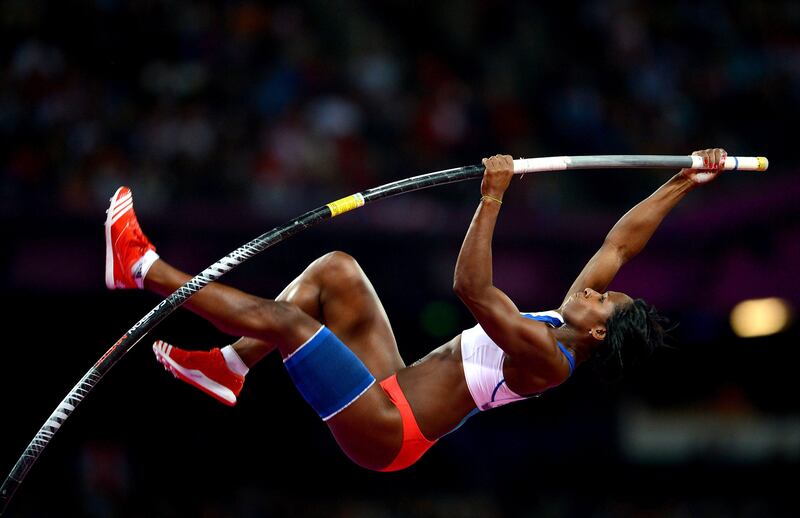 epa03346064 Yarisley Silva of Cuba competes in the women's Pole Vault final during the London 2012 Olympic Games Athletics, Track and Field events at the Olympic Stadium, London, Britain 06 August 2012.  EPA/BERND THISSEN *** Local Caption ***  03346064.jpg