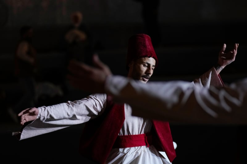 Artists perform Sufi dance in Baghdad. AP