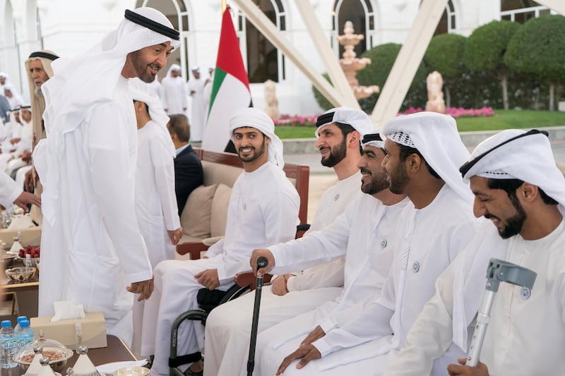 ABU DHABI, UNITED ARAB EMIRATES - February 19, 2018: HH Sheikh Mohamed bin Zayed Al Nahyan Crown Prince of Abu Dhabi Deputy Supreme Commander of the UAE Armed Forces (L) receives UAE Armed Forces servicemen who were injured on the 11th of August 2017, while serving in Yemen. Seen with HH Sheikh Zayed bin Hamdan bin Zayed Al Nahyan (2nd L).

( Rashed Al Mansoori / Crown Prince Court - Abu Dhabi )
---