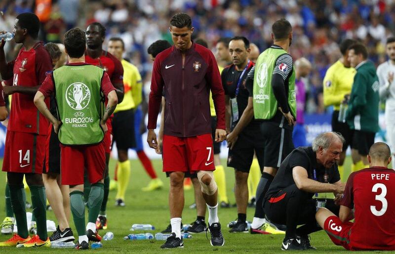 Portugal's Cristiano Ronaldo with teammates before extra time during the Uefa Euro 2016 Final against France at the Stade de France, 10 July 2016. Kai Pfaffenbach / Reuters