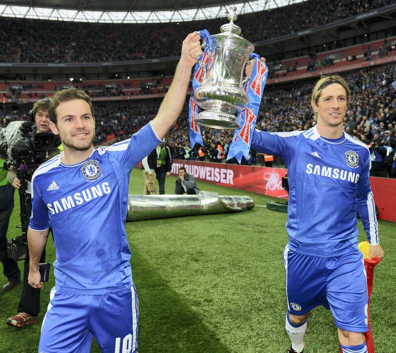 LONDON, ENGLAND - MAY 05:  Juan Mata and Fernando Torres of Chelsea celebrate victory with the trophy in the FA Cup Final with Budweiser between Liverpool and Chelsea at Wembley Stadium on May 5, 2012 in London, England.  (Photo by Darren Walsh/Chelsea FC via Getty Images)