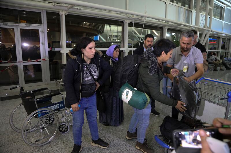 Hundreds of Iraqis have returned home from Belarus after abandoning their hopes of reaching the European Union. AP Photo