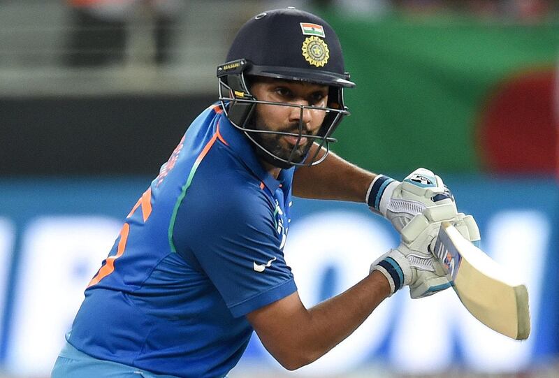 Indian Cricket team captain Rohit Sharma plays a shot during the final one day international (ODI) Asia Cup cricket match between Bangladesh and India at the Dubai International Cricket Stadium in Dubai on September 28, 2018. (Photo by ISHARA S. KODIKARA / AFP)