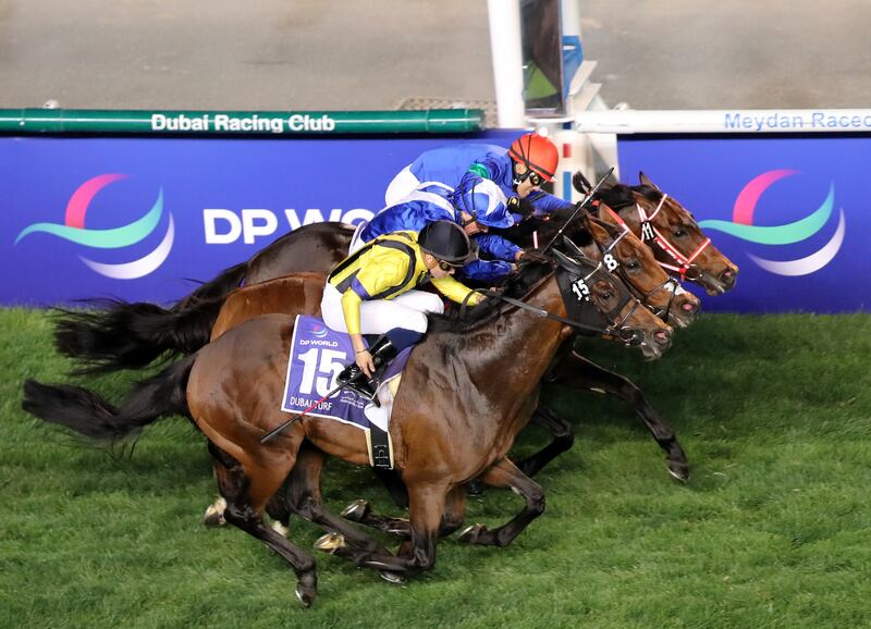 Back to front: Panthalassa, Lord North and Vin De Garde going for the line in a thrilling finish to the Dubai Turf. Chris Whiteoak / The National