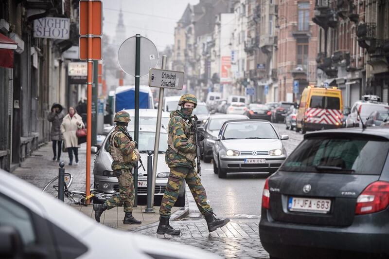 Belgian soldiers patrol in the Schaarbeek district of Brussels, Belgium, on March 23, 2016. Security services are on high alert following the previous day’s deadly explosions in the departure hall of Zaventem Airport and on the metro system in Brussels, Belgium. SIL has claimed responsibility for the attacks. Christophe Petit Tesson / EPA
