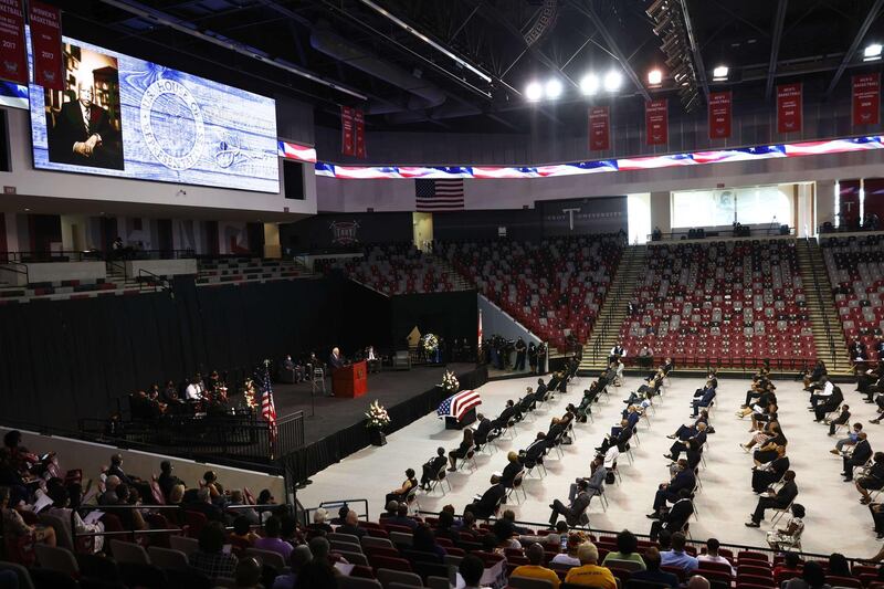 A socially-disatnced service at Troy University in Lewis's Alabama hometown. AFP